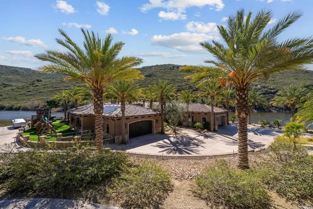 a living room with furniture flat screen tv and a fireplace
