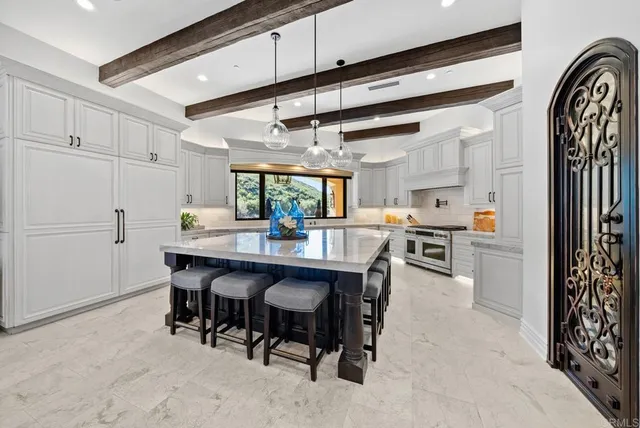 a view of a hallway view with wooden floor and staircase