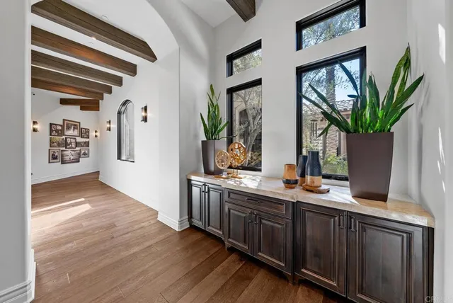 a bathroom with a toilet a sink and a mirror