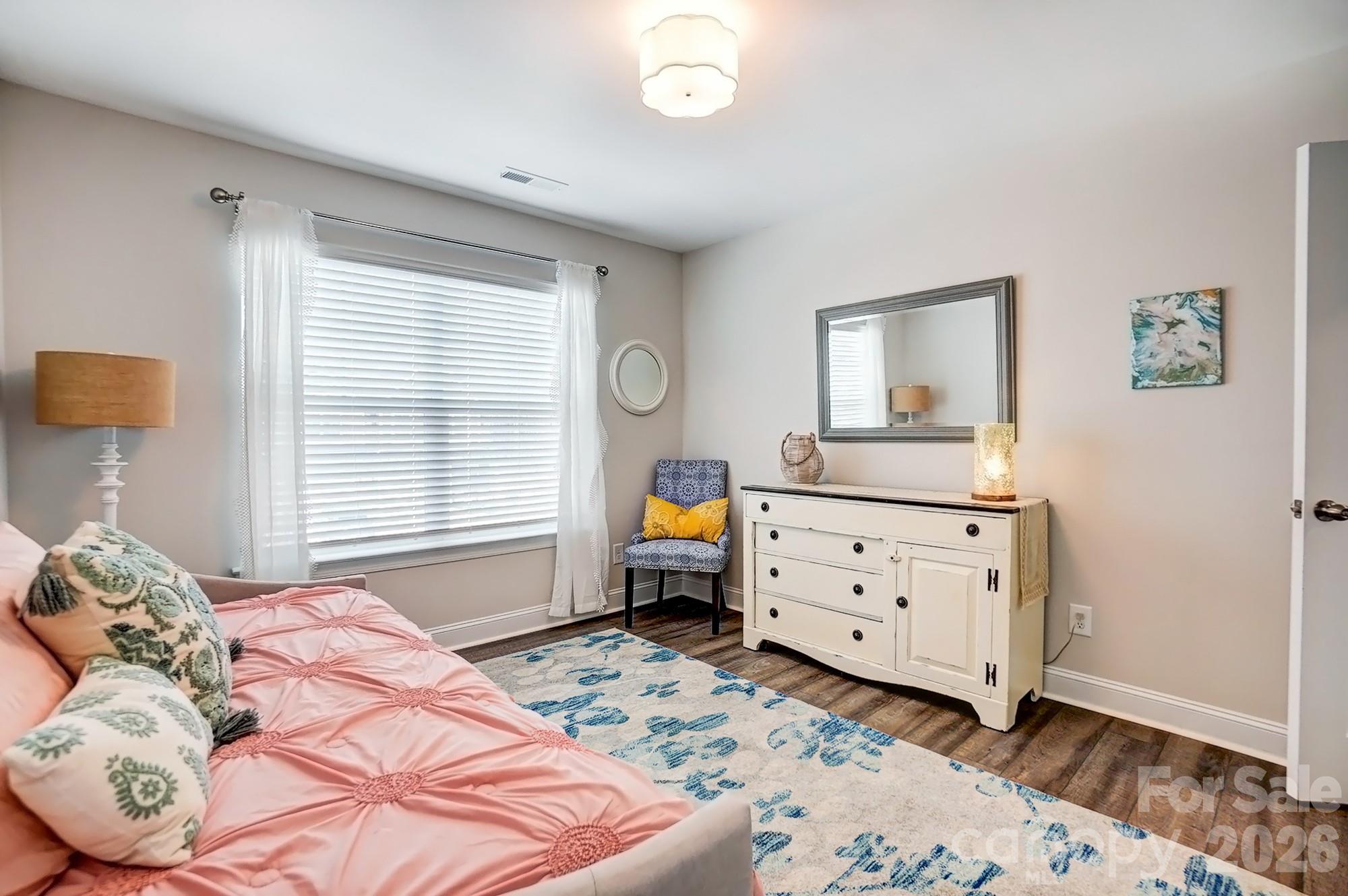 3925 Rothwood Lane Harrisburg, NC 28075 - Photo 36 of 48 a bedroom with a bed and a dresser