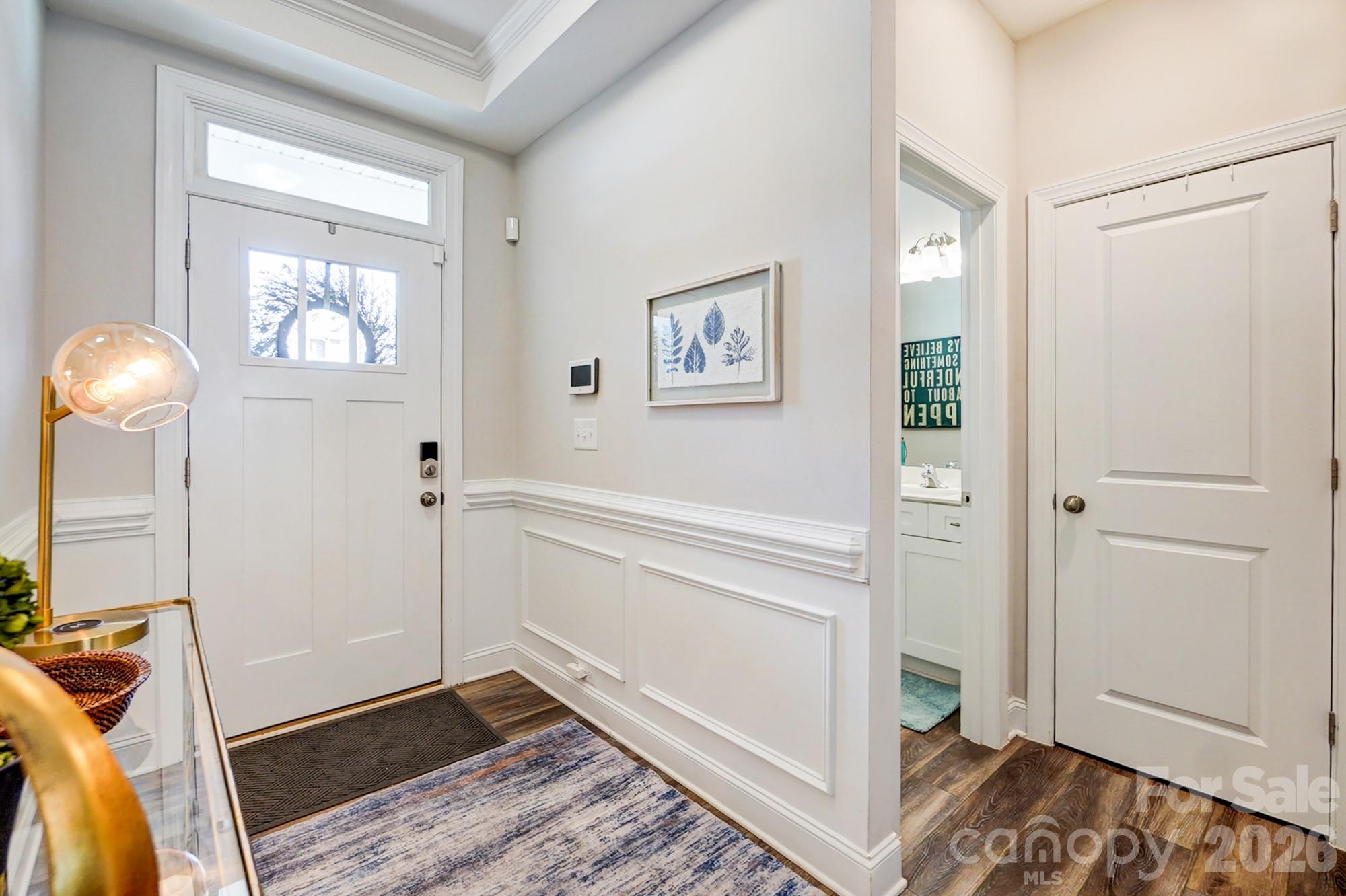 3925 Rothwood Lane Harrisburg, NC 28075 - Photo 5 of 48 a view of a room with wooden floor and cabinet