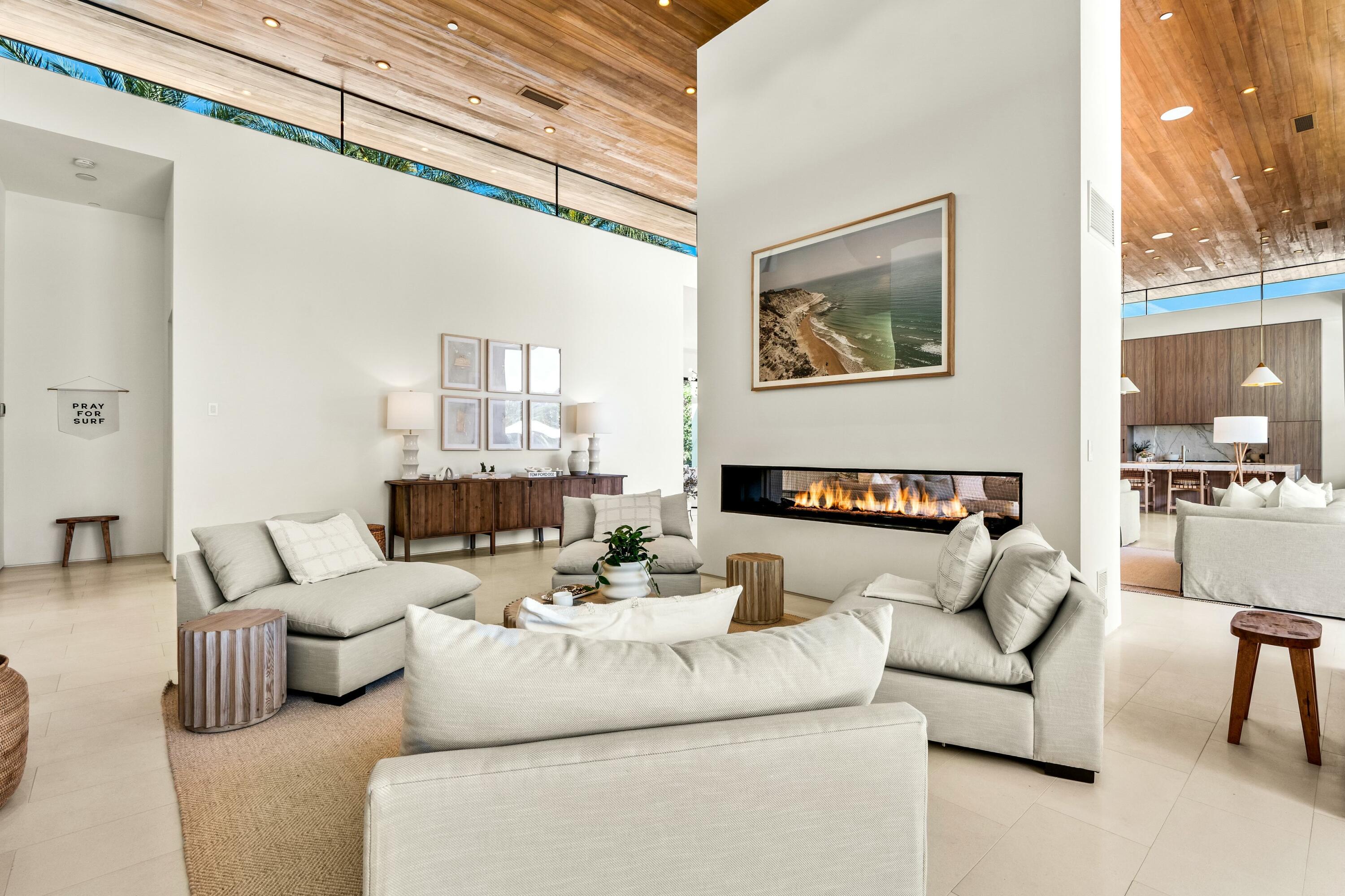 3 Makena Lane Rancho Mirage, CA 92270 - Photo 15 of 38 a living room with furniture and a large window
