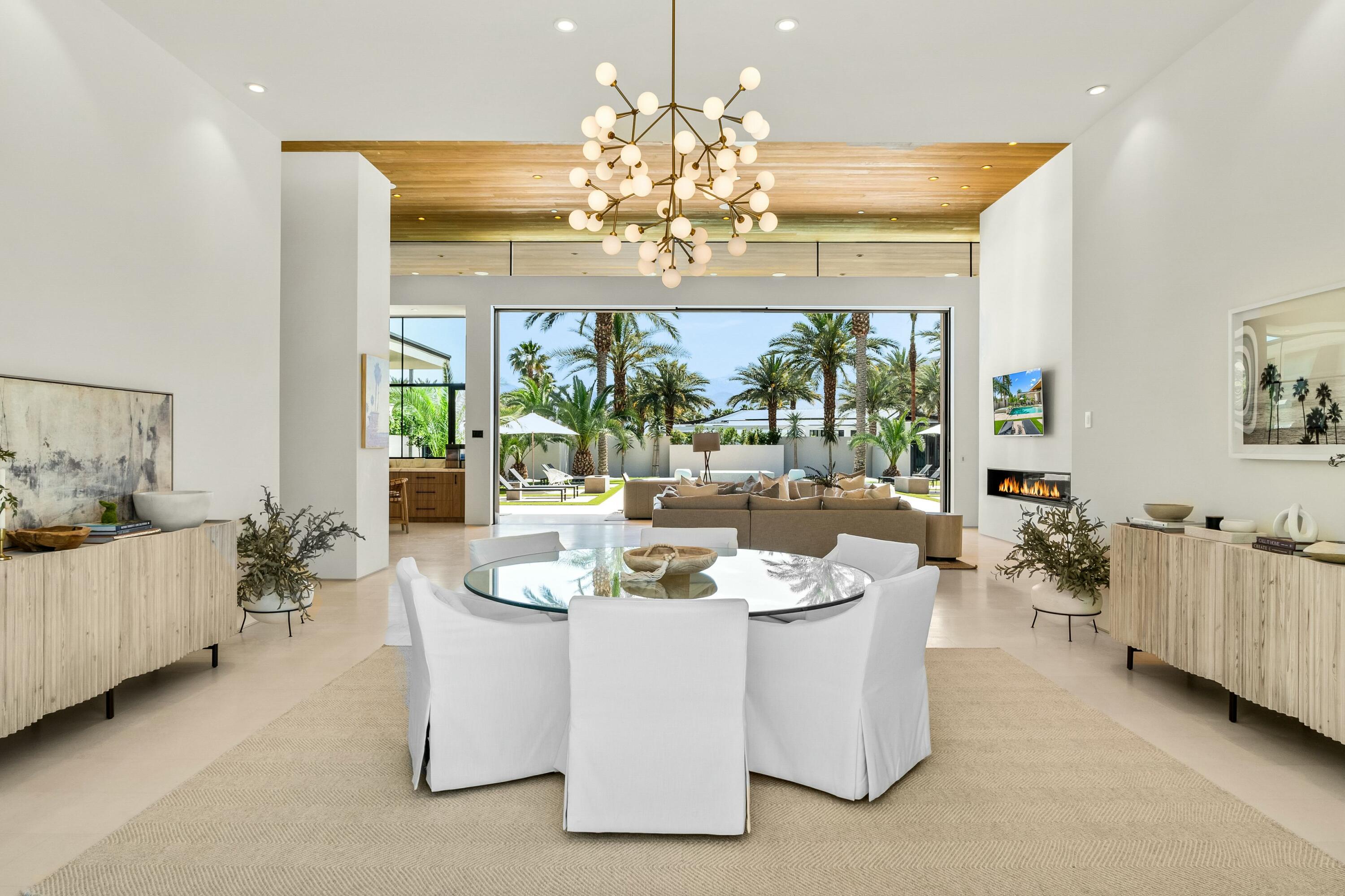 3 Makena Lane Rancho Mirage, CA 92270 - Photo 17 of 38 a dining room with furniture a chandelier and window