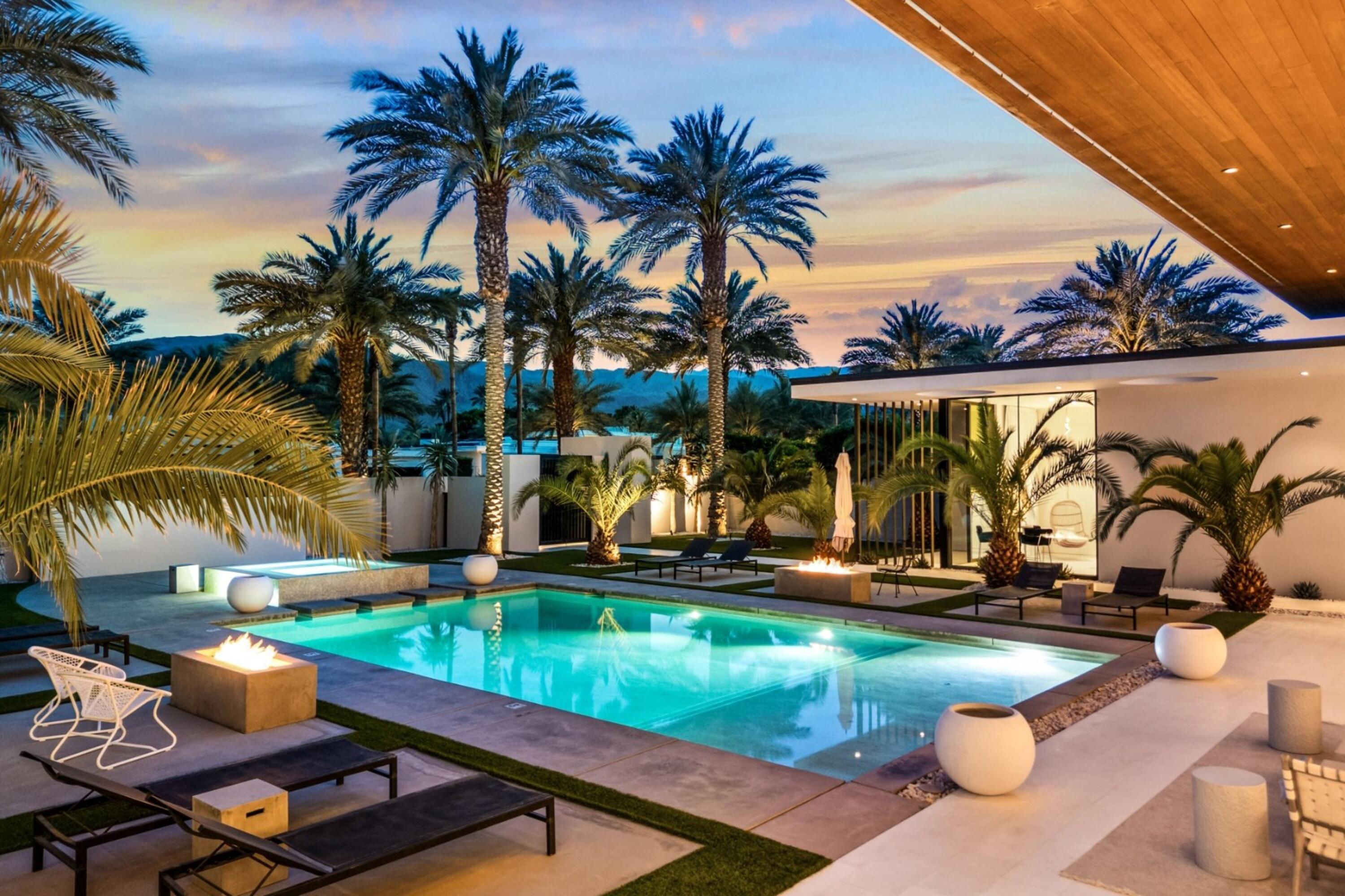 3 Makena Lane Rancho Mirage, CA 92270 - Photo 2 of 38 a view of a backyard with swimming pool and sitting area