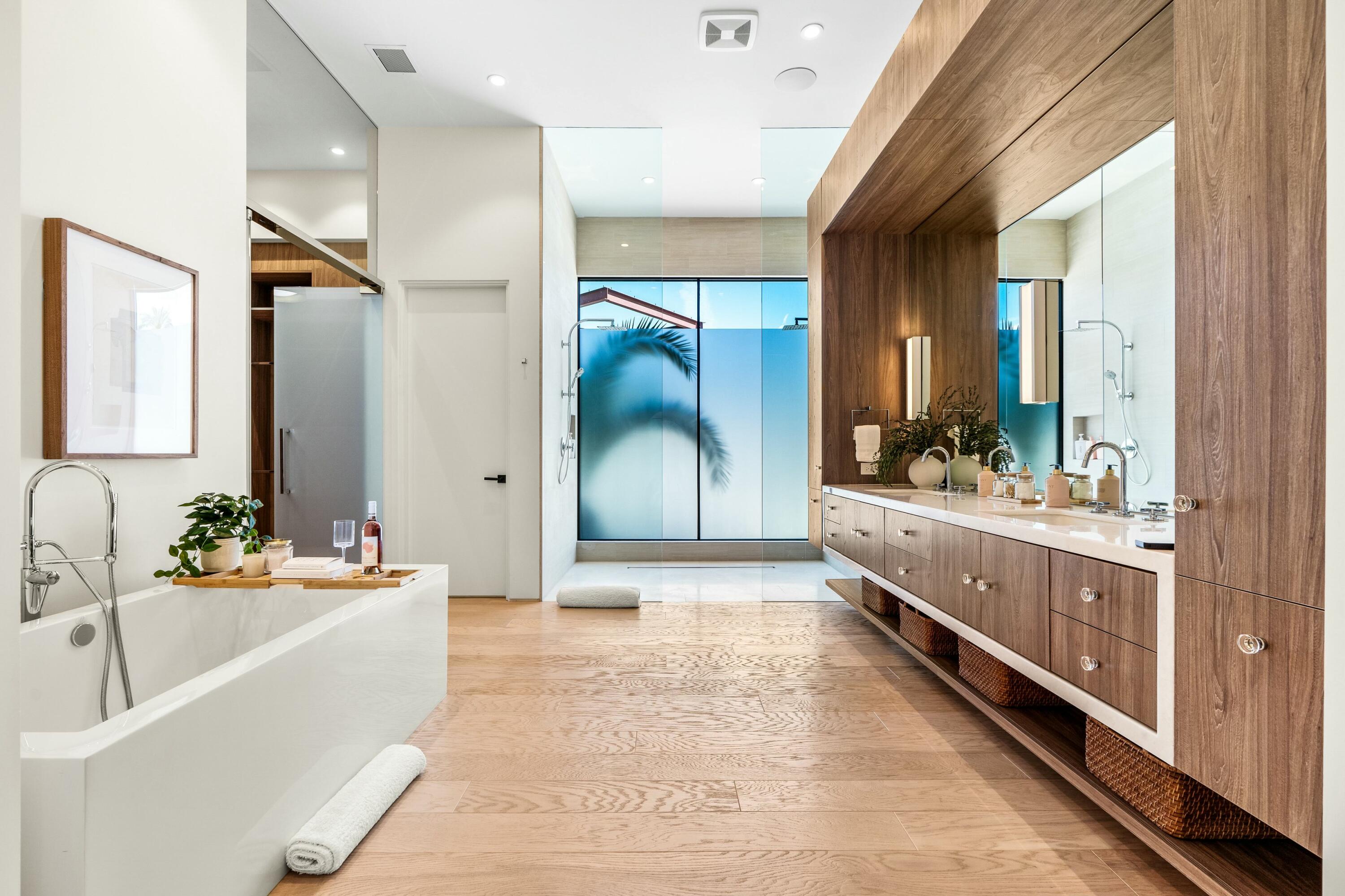 3 Makena Lane Rancho Mirage, CA 92270 - Photo 23 of 38 a bathroom with a double vanity sink mirror and bathtub