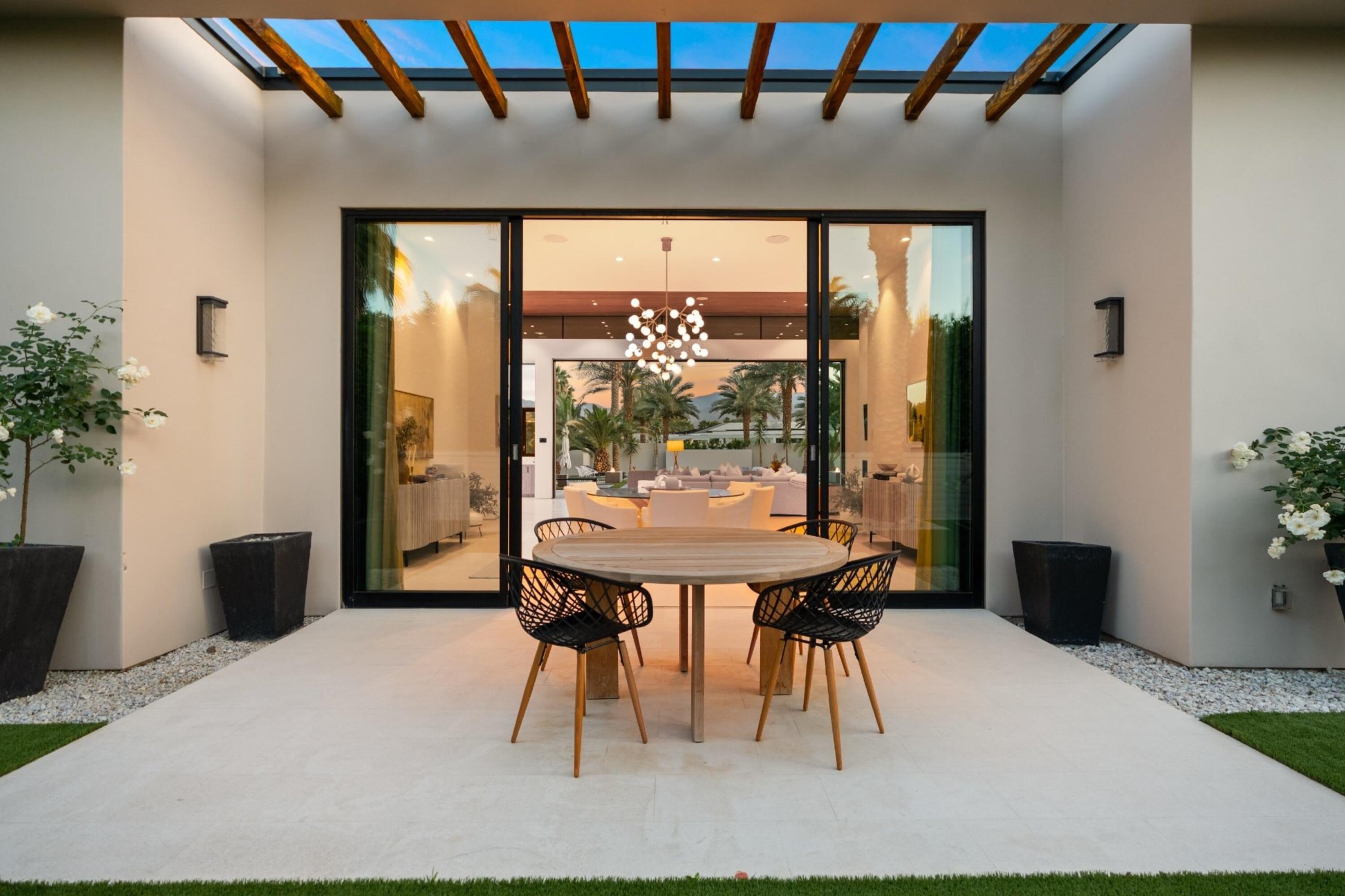3 Makena Lane Rancho Mirage, CA 92270 - Photo 26 of 38 a view of a dining room with furniture and window