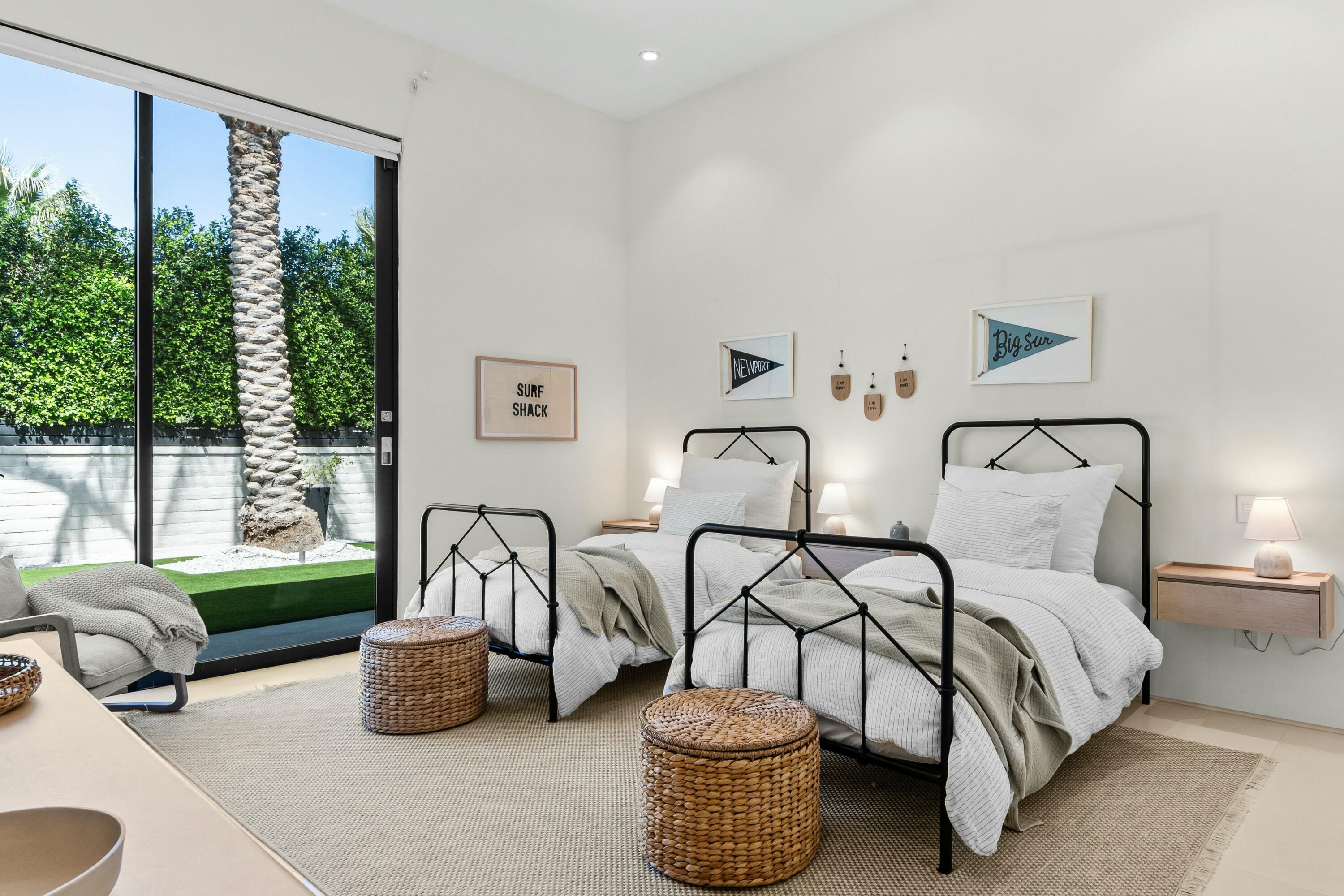 3 Makena Lane Rancho Mirage, CA 92270 - Photo 29 of 38 a bedroom with furniture and a large window