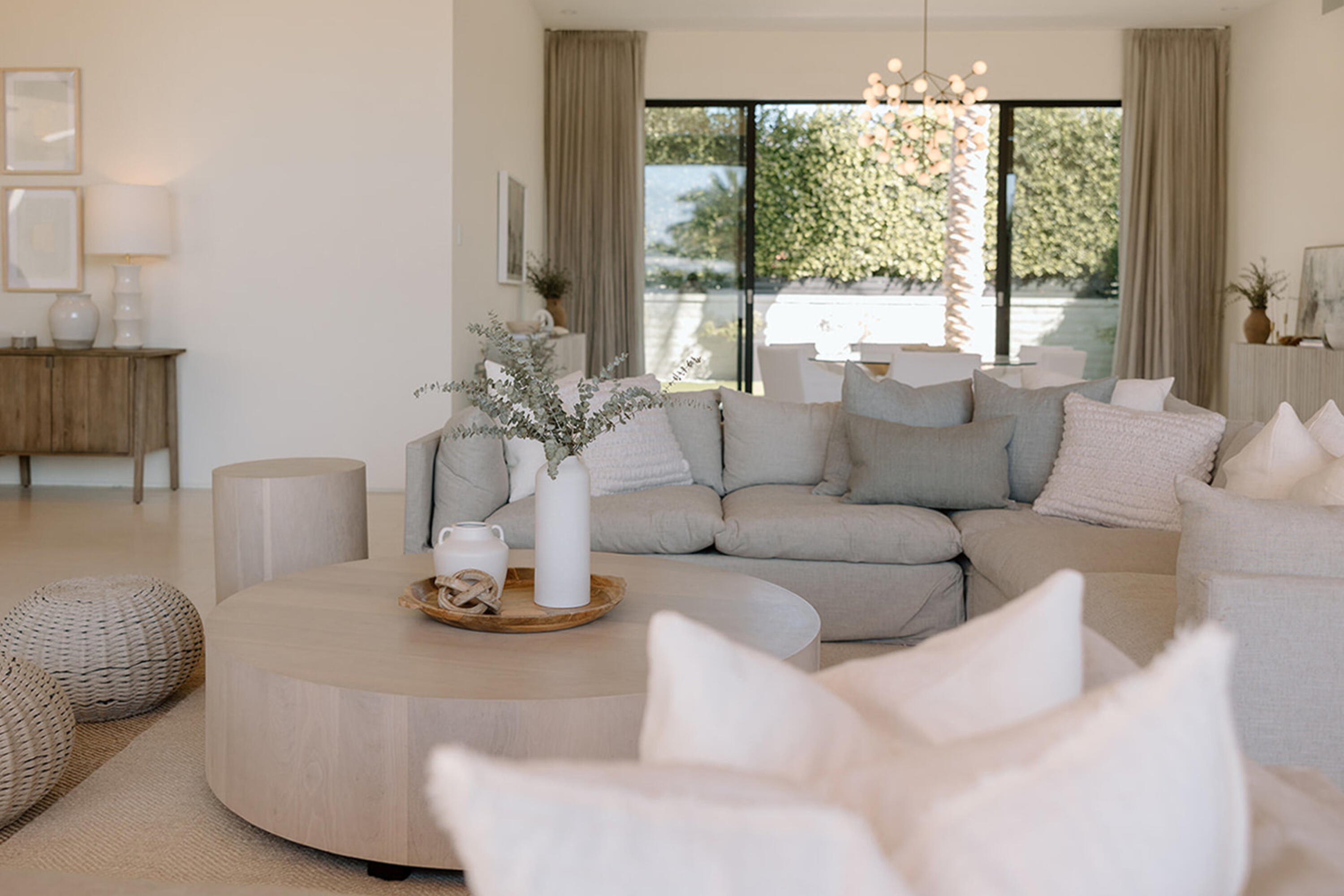 3 Makena Lane Rancho Mirage, CA 92270 - Photo 9 of 38 a living room with furniture and a large window