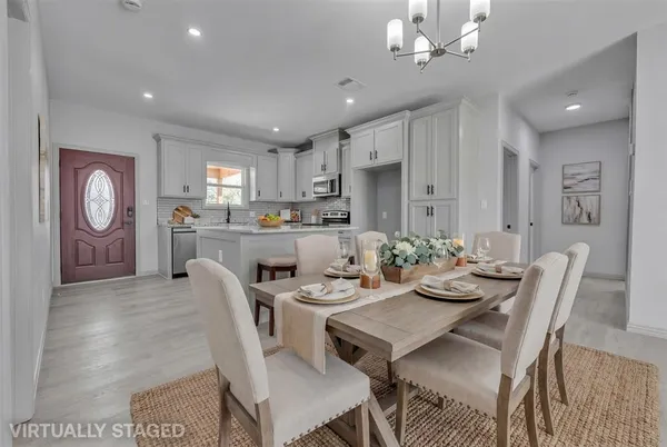 a view of a dining room with furniture