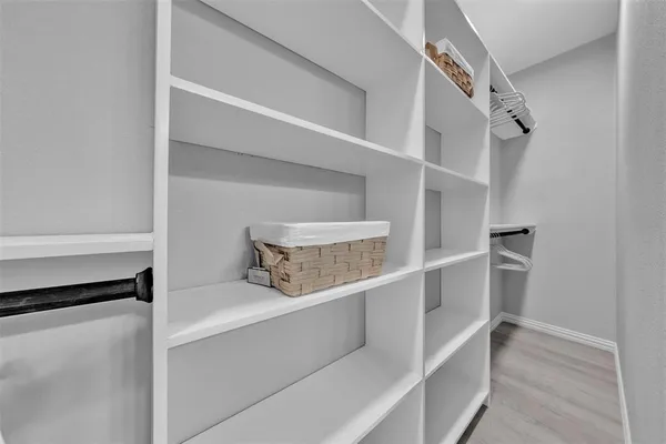 a view of an empty walk in closet