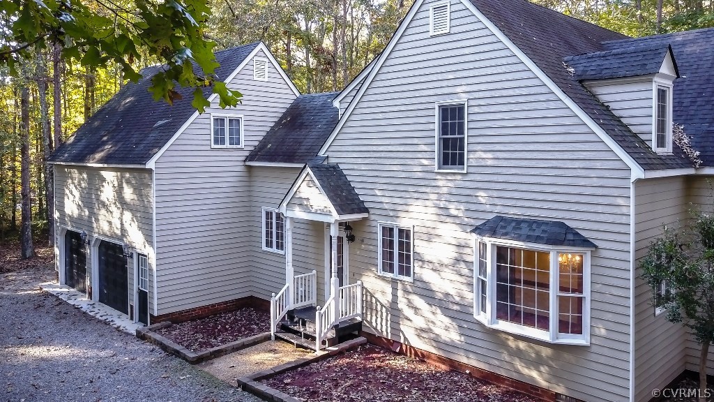 5801 Deep Forest Road Chester, VA 23831 - Photo 3 of 50 a front view of a house with garden