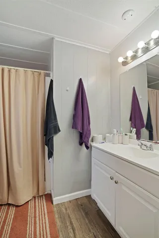 a view of bathroom with dual sinks