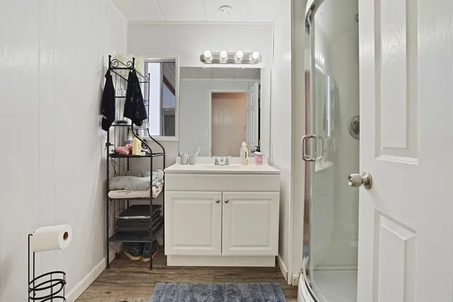 a bathroom with a sink and a mirror