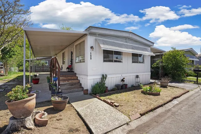 a view of a porch with sitting area