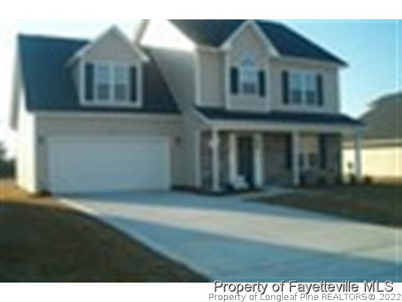 1932 Jenny Road Fayetteville, NC 28314 - Photo 1 of 6 a view of a house with a yard