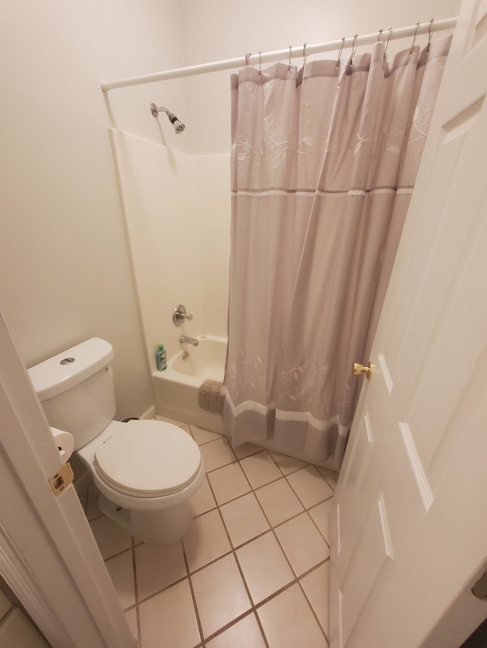 910 Churchill Crossing Madison, TN 37115 - Photo 20 of 38 a bathroom with a toilet and a shower