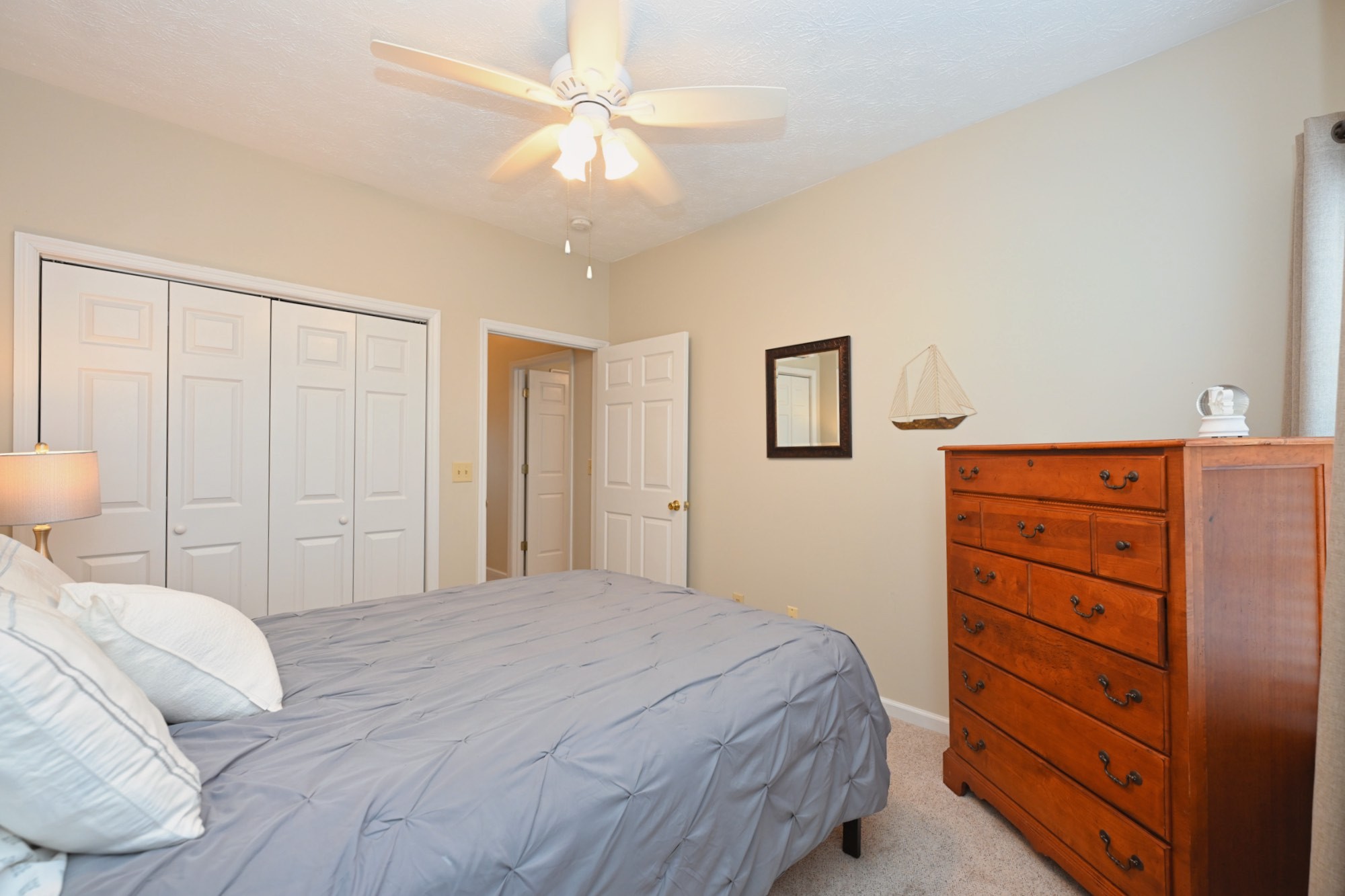 910 Churchill Crossing Madison, TN 37115 - Photo 24 of 38 a bedroom with a bed and a dresser