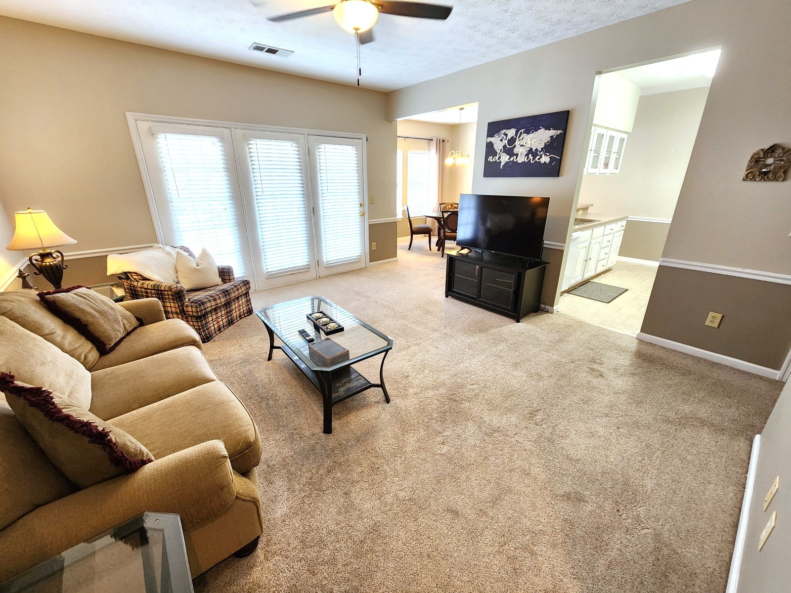 910 Churchill Crossing Madison, TN 37115 - Photo 3 of 38 a living room with furniture and a flat screen tv