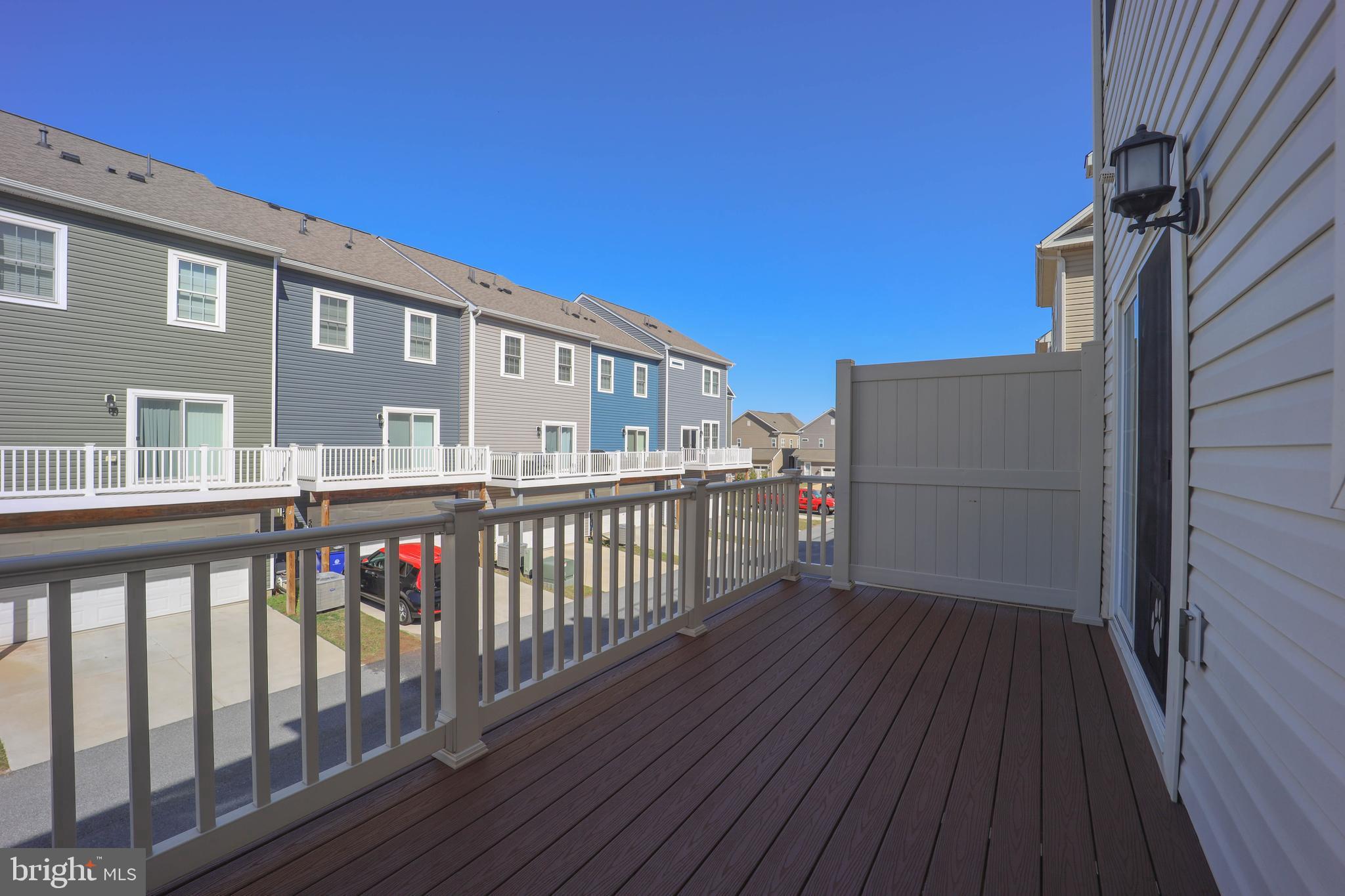 5054 Judicial Way Frederick, MD 21703 - Photo 12 of 28 a view of a balcony with wooden floor