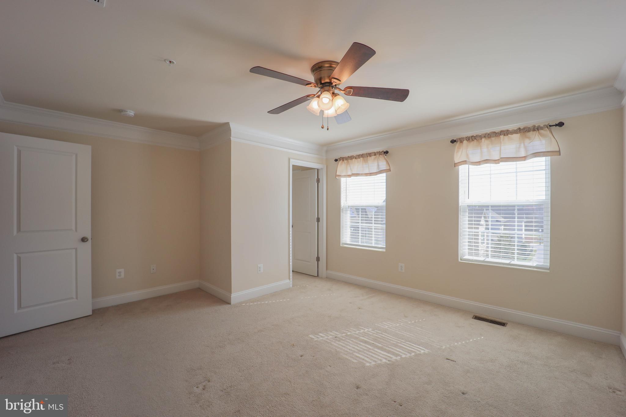 5054 Judicial Way Frederick, MD 21703 - Photo 16 of 28 a view of an empty room with a window