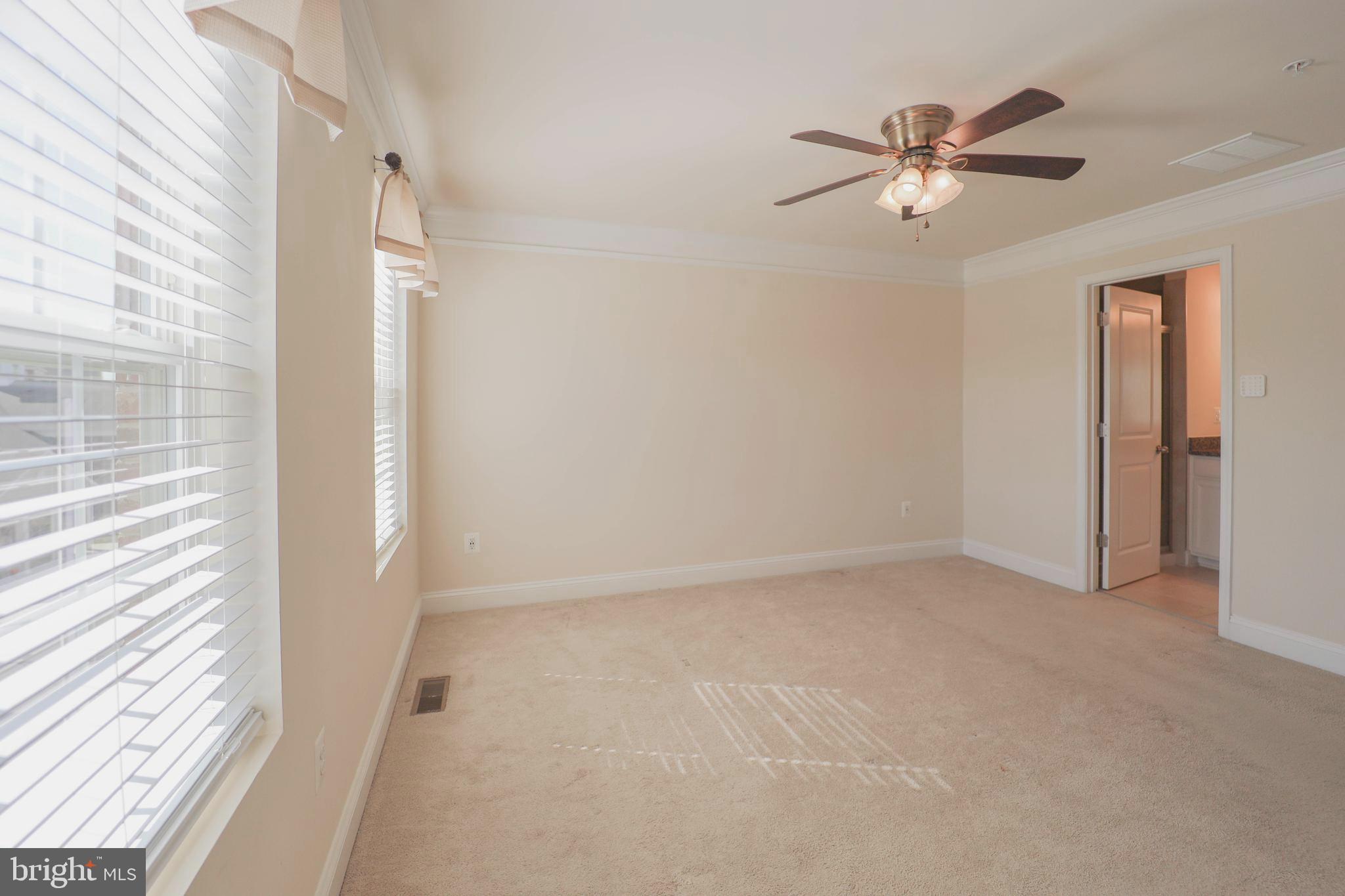 5054 Judicial Way Frederick, MD 21703 - Photo 18 of 28 a view of an empty room with a window