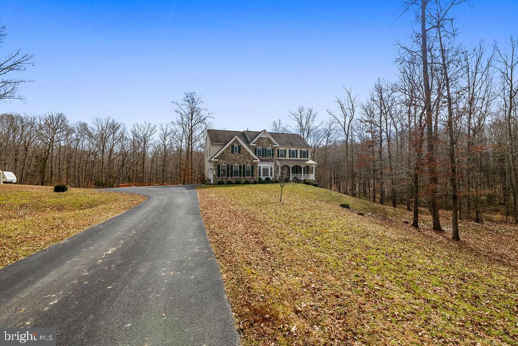 14367 Crawleys Dam Road Goldvein, VA 22720 - Photo 2 of 46 Long asphalt driveway to your new home!