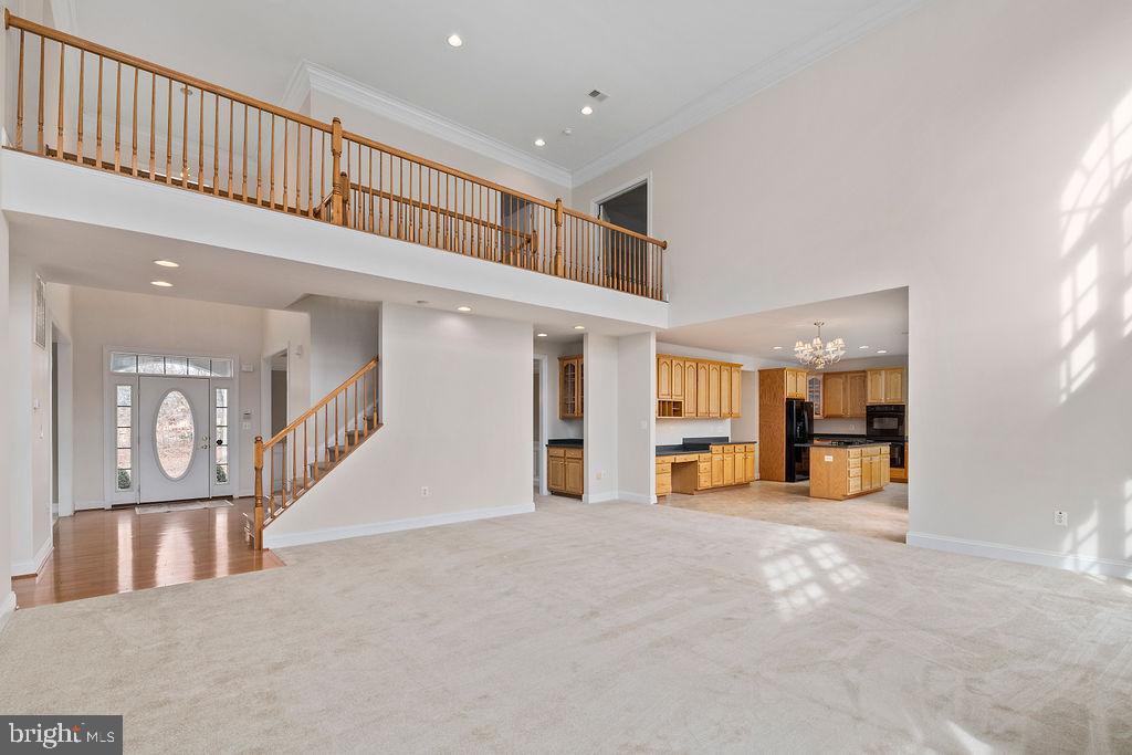 14367 Crawleys Dam Road Goldvein, VA 22720 - Photo 14 of 46 2-story family room with double crown molding