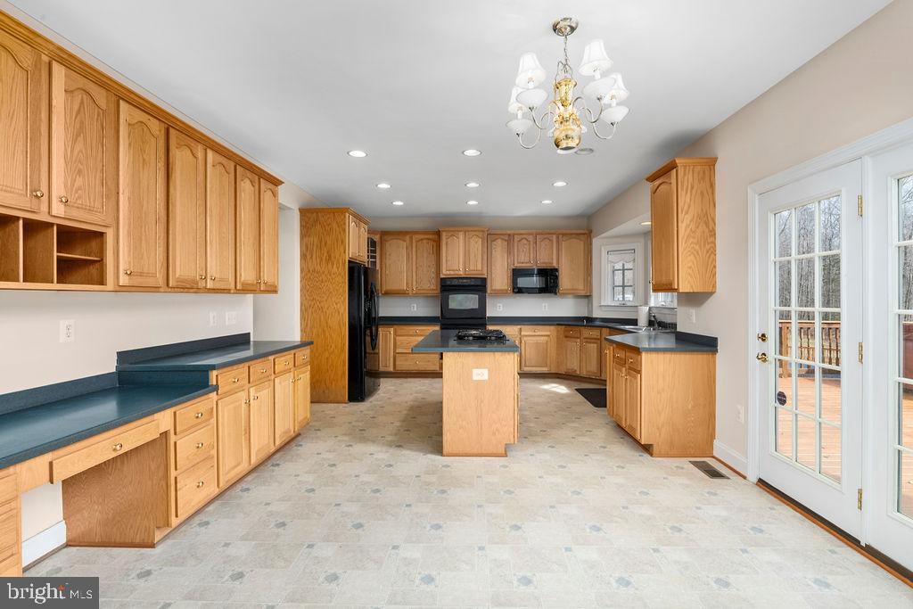14367 Crawleys Dam Road Goldvein, VA 22720 - Photo 17 of 46 Large kitchen with plentiful cabinet space!