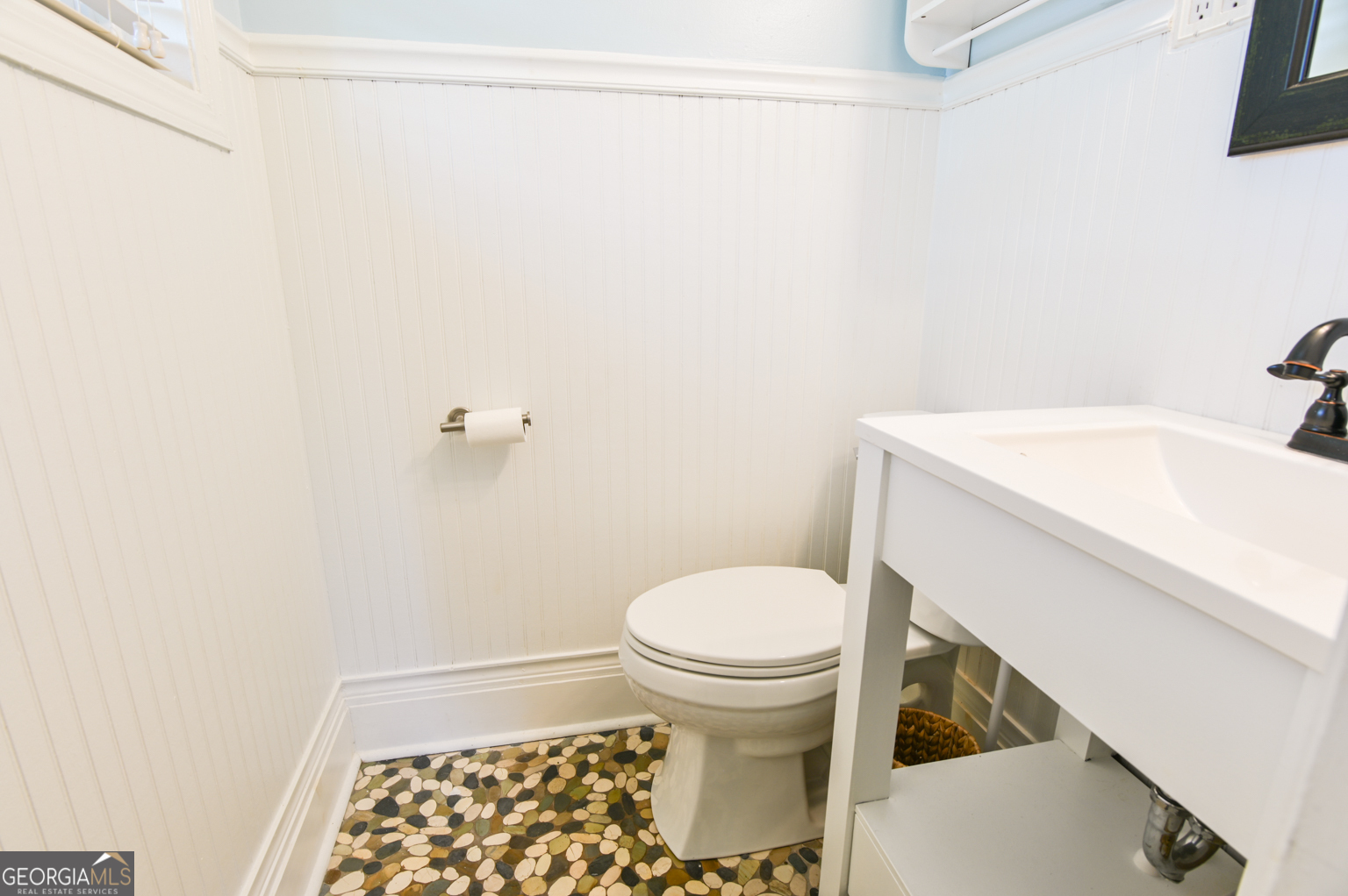 545 Forest Hill Road Macon, GA 31210 - Photo 53 of 63 a bathroom with a sink and a toilet
