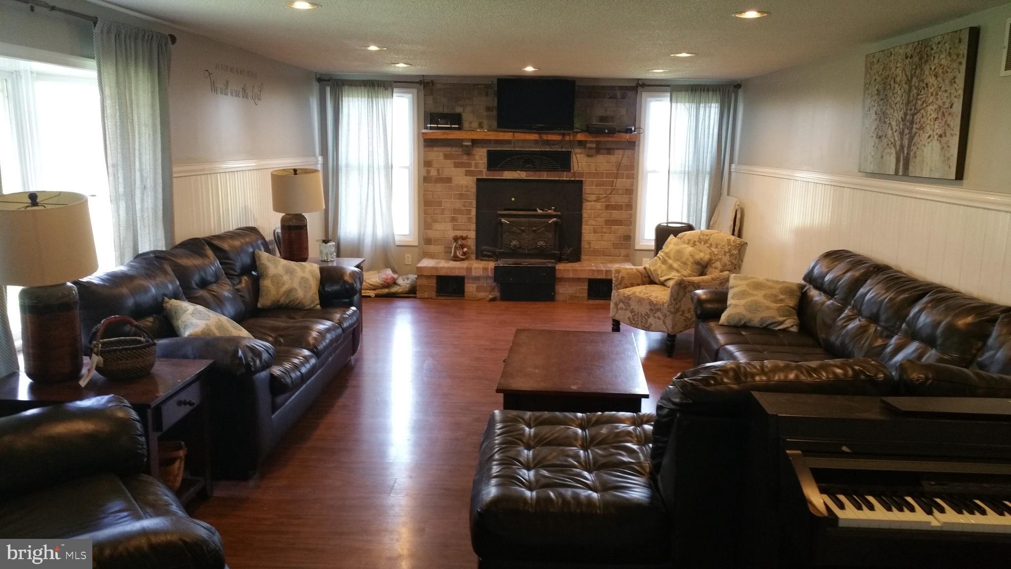 Living Room with Woodstove/Fireplace