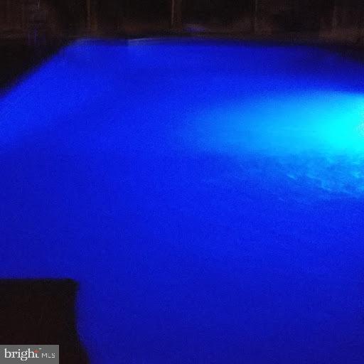 2311 Bear Run Road Westminster, MD 21158 - Photo 8 of 62 Pool at night with in pool lighting
