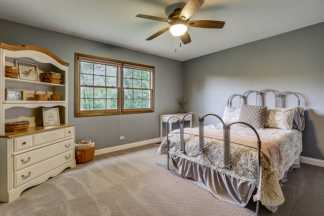 2767 Sun Valley Road Lisle, IL 60532 - Photo 16 of 23 a bedroom with furniture and window