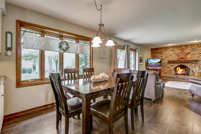 2767 Sun Valley Road Lisle, IL 60532 - Photo 7 of 23 a view of a dining room with furniture window and wooden floor