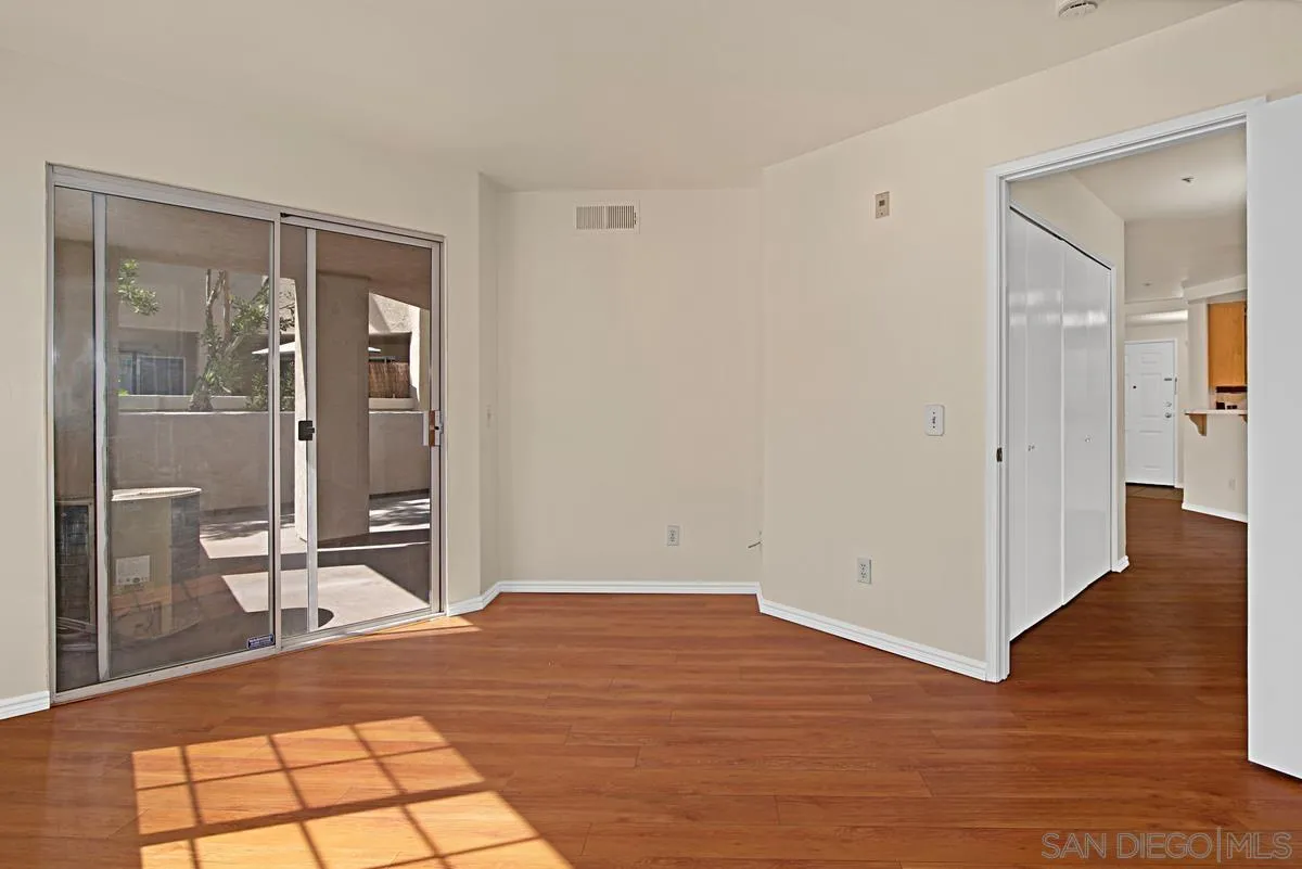11235 Affinity Court, Unit 68 San Diego, CA 92131 - Photo 18 of 29 a view of a room with wooden floor