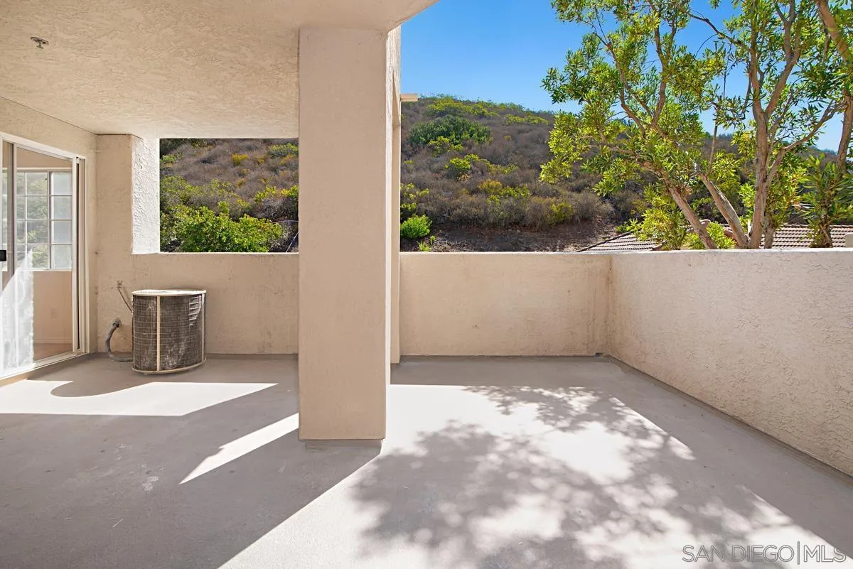 11235 Affinity Court, Unit 68 San Diego, CA 92131 - Photo 23 of 29 a view of a room with a large window