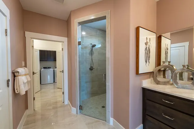 a bathroom with a sink vanity and mirror