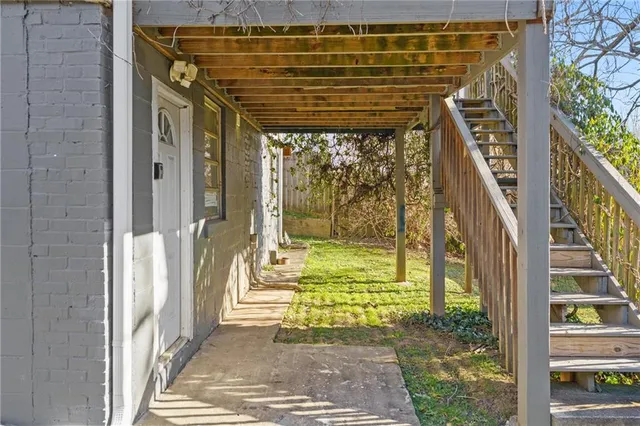 a view of swimming pool with outdoor seating