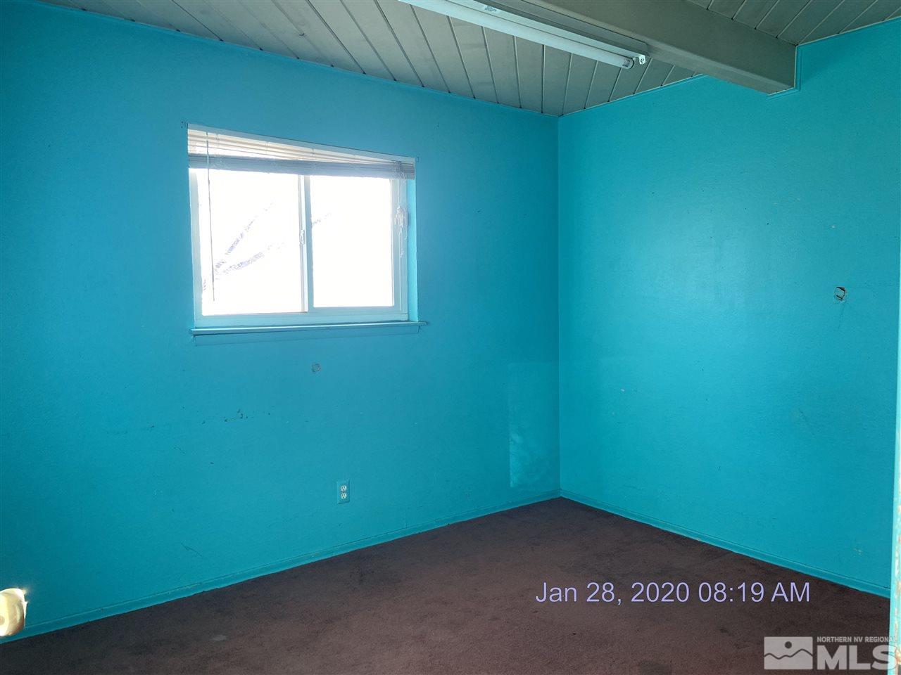 1715 Haddock Drive Reno, NV 89512 - Photo 11 of 17 an empty room with a window