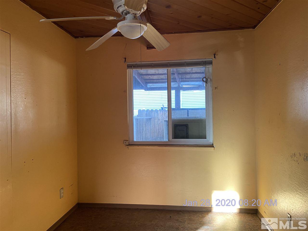 1715 Haddock Drive Reno, NV 89512 - Photo 12 of 17 a view of a room that has a window and wooden floor