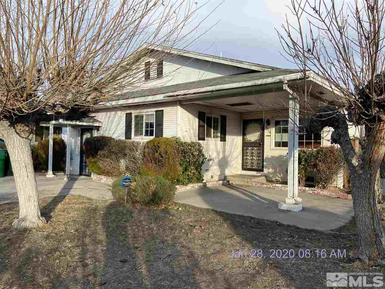 1715 Haddock Drive Reno, NV 89512 - Photo 2 of 17 a front view of a house with garden