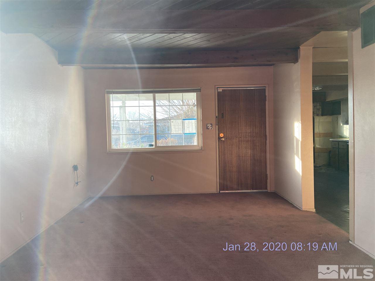 1715 Haddock Drive Reno, NV 89512 - Photo 3 of 17 an empty room with windows