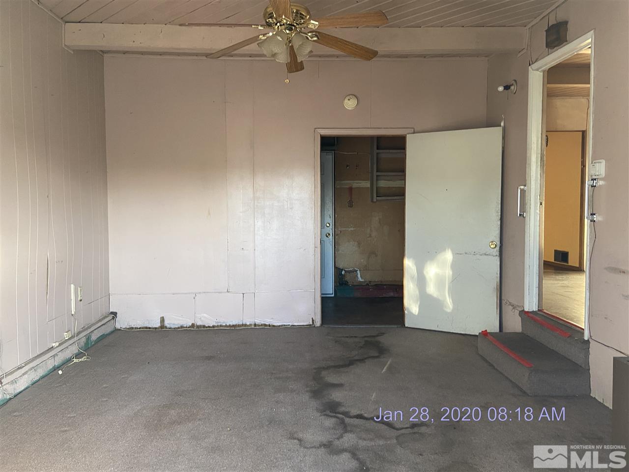 1715 Haddock Drive Reno, NV 89512 - Photo 5 of 17 an empty room with windows and entrance