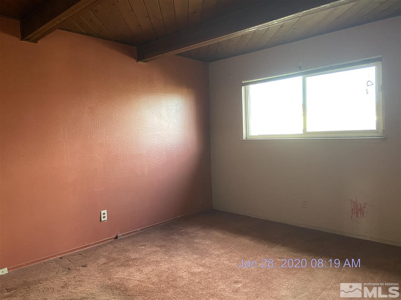 1715 Haddock Drive Reno, NV 89512 - Photo 8 of 17 an empty room with a window