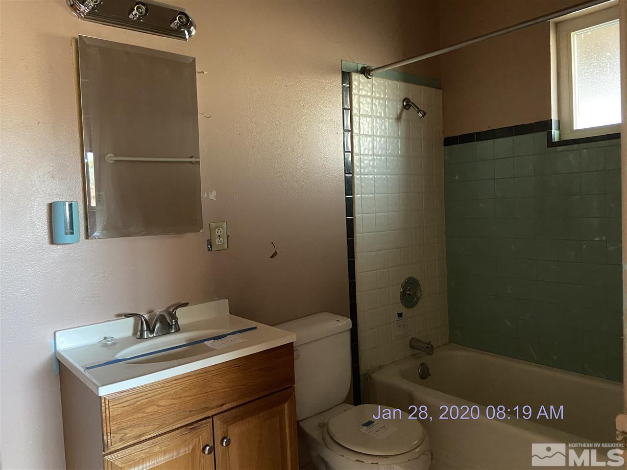 1715 Haddock Drive Reno, NV 89512 - Photo 9 of 17 a bathroom with a sink toilet and shower
