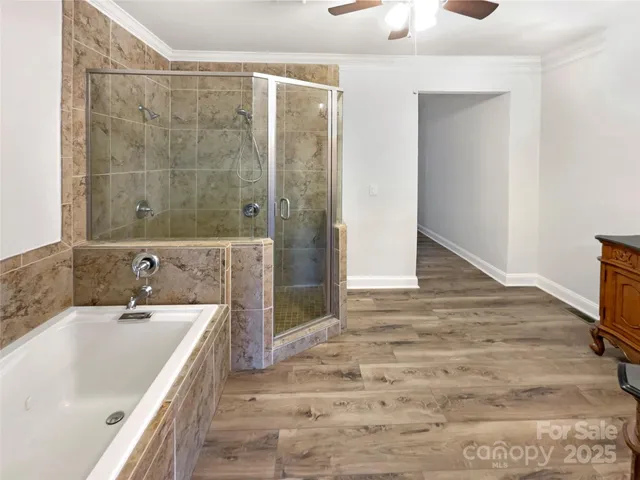 a bathroom with a bathtub and a sink
