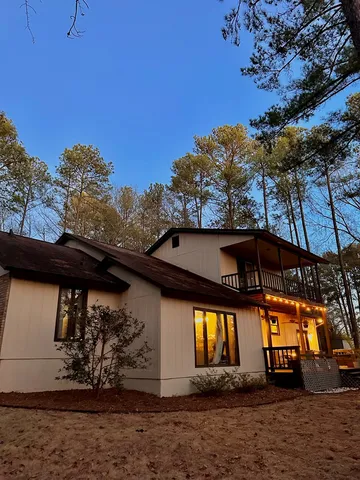 a view of a street with flower plants