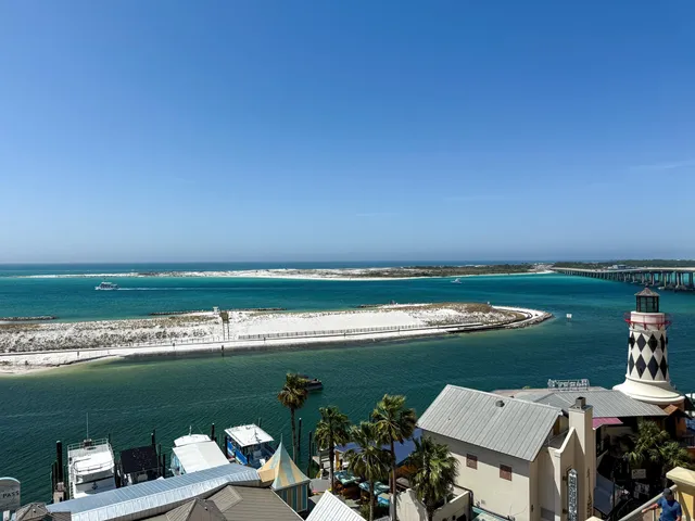 an aerial view of a house with a lake view