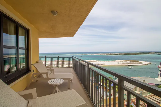 a view of swimming pool with seating space