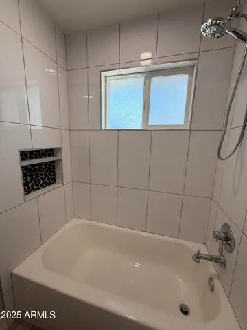 a bathroom with a bathtub