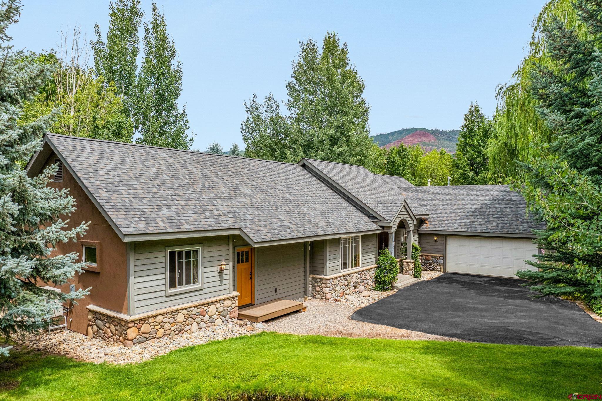 a view of a yard in front of house